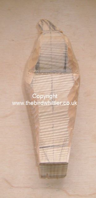 Using the Stanley knife the bird is taking shape.