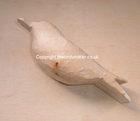 The photo shows you that knots sometime show deeper in the wood.